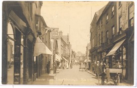 Photo:Postcard of Baxtergate, Loughborough.  The distinctive sign for the Rose and Crown can be seen on the left hand side