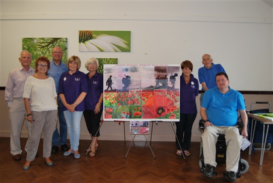 Photo:Members of the Newark and Muskham art groups with the finished work