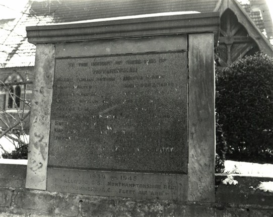 Photo:The war mememorial is in the wall outside the church