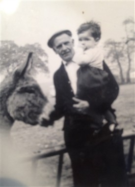 Photo:John French (Carol's brother) with Walt and the donkeys