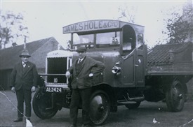 Photo:Mr Cecil Rawding (right) with his Hole's delivery vehicle AL 2424